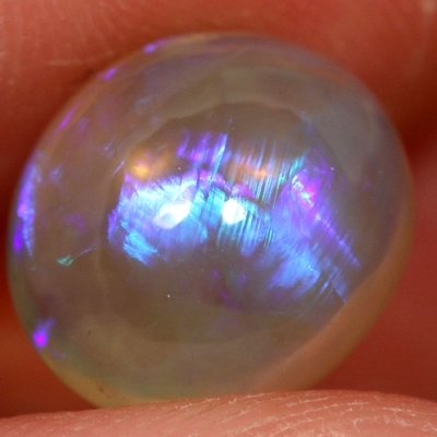 SOLID CRYSTAL OPAL Large opal with bright blue and purple rolling flashes